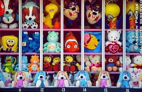 A photo of the colorful stuffed animal prizes at Coney Island's game arcade