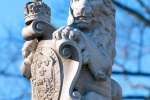 Statue of a lion representing the British monarchy from Colonial Williamsburg, VA. Fine art prints of this photo are available framed in various styles. 