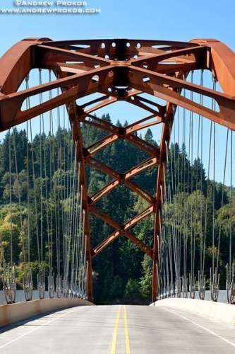 A view of the Sauvie Island Bridge's tied-arch structure from the bridge's deck. Portland, Oregon