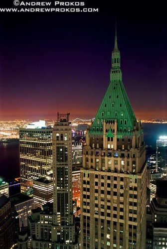 A view of 40 Wall Street (the Trump Building) and New York's Financial District at night