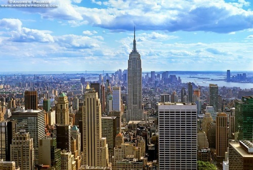 A cityscape of New York City and the Empire State Building as seen from Rockefeller Center.