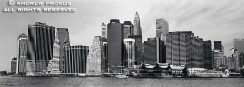 A black and white panoramic skyline of Lower Manhattan as seen from Brooklyn, New York City