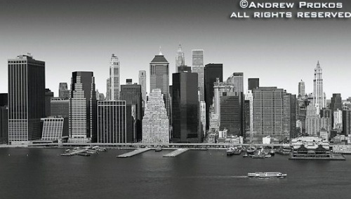 An aerial view of Lower Manhattan in black and white, New York City. Fine art prints of this photo are available framed in various styles, please inquire.