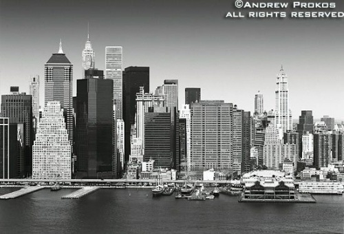 An aerial view of Lower Manhattan in black and white, New York City. Fine art prints of this photo are available framed in various styles, please inquire.