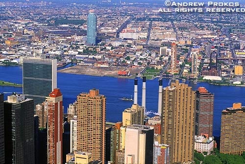 An aerial view of East Midtown Manhattan, the East River and Queens, New York City