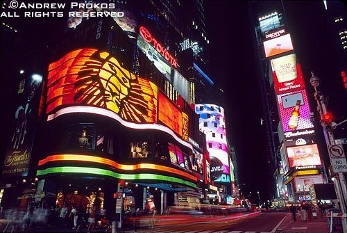 The electronic 'jumbotron' signs along Broadway in Times Square at night, New York City