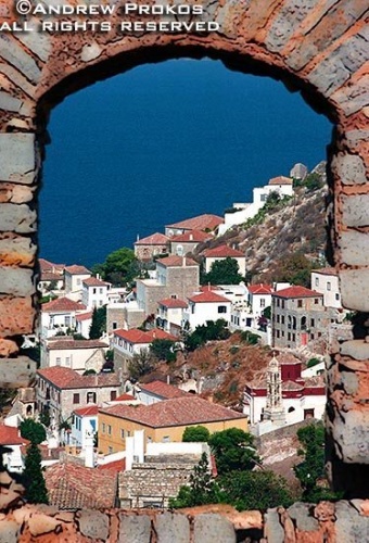 View of Hydra Town through a stone window, Hydra, Greece