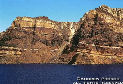 The colorful volcanic stone cliffs of Santorini, Greece
