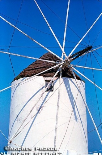 An whitewashed windmill on the island of Santorini, Greece