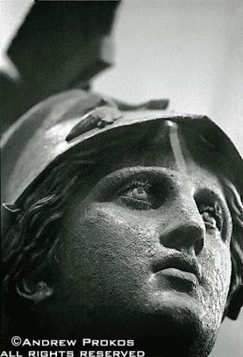 A bronze statue of the goddess Athena in Piraeus Museum, Athens in black and white