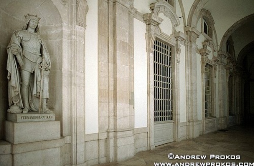 Interior of the Spanish royal palace with statue of King Ferdinand, Madrid