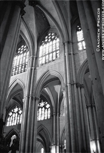 Interior of the Gothic Cathedral of Toledo, Spain in black and white