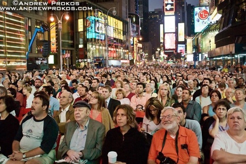 Spectators watch the opening night performance of the Metropolitan Opera in Times Square