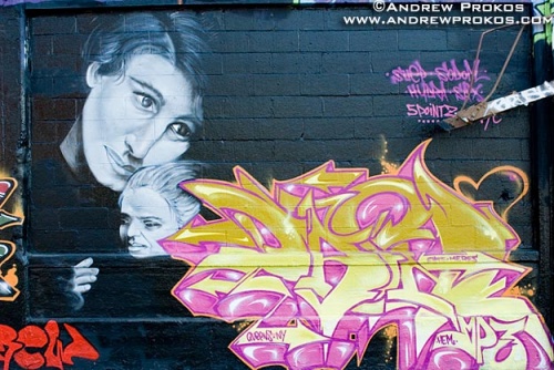 A painted street mural depicting a mother and child in Queens, New York City. Framed fine art prints of this photo are available in various sizes. 