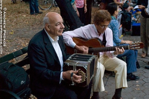 Tango musicians playing the bandoleon and guitar in Central Park, NYC