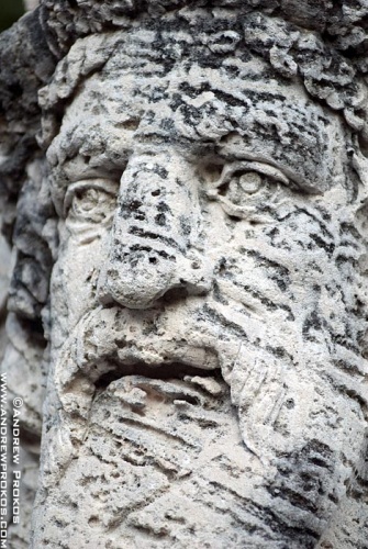 Close-up view of a coralstone herm in the gardens of Vizcaya Museum, Miami, Florida. Framed fine art prints of this photo are available in various styles. 