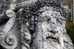 An allegorical herm made of coralstone in the gardens of Vizcaya Museum, Miami, Florida