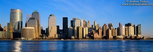 A panoramic skyline of Lower Manhattan during the day as seen from New Jersey