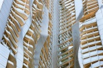 An architectural detail photograph of the warped facade of 8 Spruce Street by Gehry Partners, Manhattan, New York City. Fine art prints of this photo are available framed in various styles. 