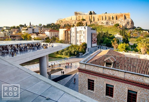 A view of the Acropolis and the terrace of the Acropolis Museum in Athens, Greece. Bernard Tschumi Architect. Fine art prints of this photo are available framed in various styles.