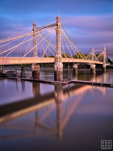 A view of the Albert Bridge and River Thames in London, captured with a four minute long exposure at dusk.