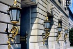 A color architectural photo of the ornate lamps from the exterior of the Mellon Auditorium building in Washington DC