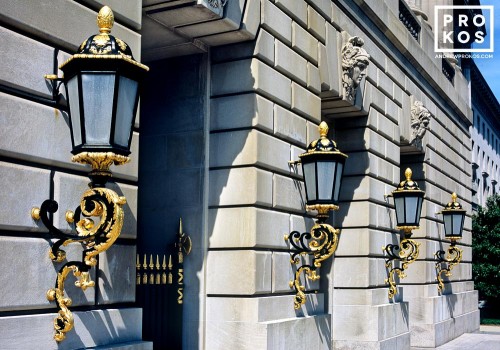 A color architectural photo of the ornate lamps from the exterior of the Mellon Auditorium building in Washington DC