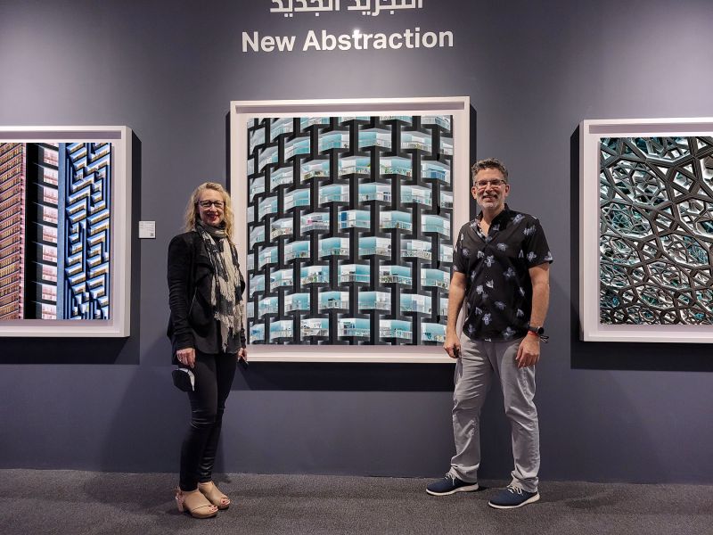 Photographers Andrew Prokos and Debi Cornwall pictured with large-scale photographs from the series 'Inverted' at Prokos's solo exhibition 'New Abstraction', Xposure Photo Festival.