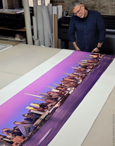 Photographer Andrew Prokos with a 96" limited edition print of Panoramic Skyline of Manhattan West Panorama