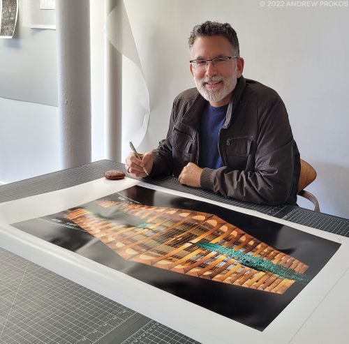 Photographer Andrew Prokos signing a limited edition print of 'Palacio do Itamaraty at Night', from his series Niemeyer's Brasilia