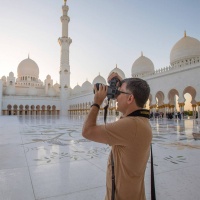 Photographer Andrew Prokos on a photo shoot at Sheikh Zayed Grand Mosque in Abu Dhabi, UAE