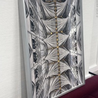 A framed limited edition print of "Sanctuary of Light - Westminster Abbey Interior #1" by fine art photographer Andrew Prokos being prepared for installation in the offices of a London financial services firm.