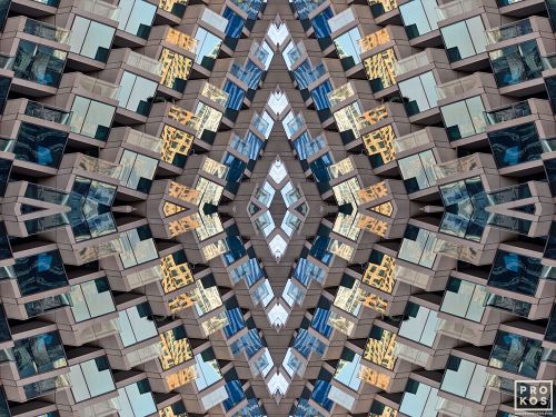 An abstract fine art photograph capturing the concentric levels of glass windows and multicolored reflections from a modern building facade in Dubai, United Arab Emirates. Large-scale limited edition prints of this photo are available up to 96 inches in width. 