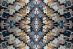 An abstract fine art photograph capturing the concentric levels of glass windows and multicolored reflections from a modern building facade in Dubai, United Arab Emirates. Large-scale limited edition prints of this photo are available up to 96 inches in width. 
