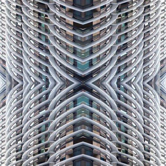 Abstract photography capturing an undulating contemporary architectural facade in tones of white, grey, gold, with pops of aqua. Andrew's Archistracts series is derived fully from lens-based photographic captures. Large-scale limited edition prints of this photo are available up to 120 inches.