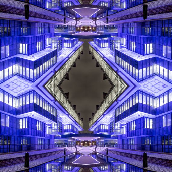 A striking architectural abstract photo in shades of violet, based on reflections of contemporary architecture in London, UK. Large-scale limited edition prints of this photo are available up to 96 inches in height