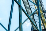 A view of the steel girders under the Nitro amusement park ride, from the fine art architectural photo series "The Architecture of Amusement"