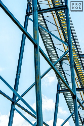 A view of the steel girders under the Nitro amusement park ride, from the fine art architectural photo series "The Architecture of Amusement"