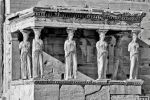 A black and white fine art photograph of the Porch of the Caryatids in the Erechtheion on the Acropolis in Athens, Greece
