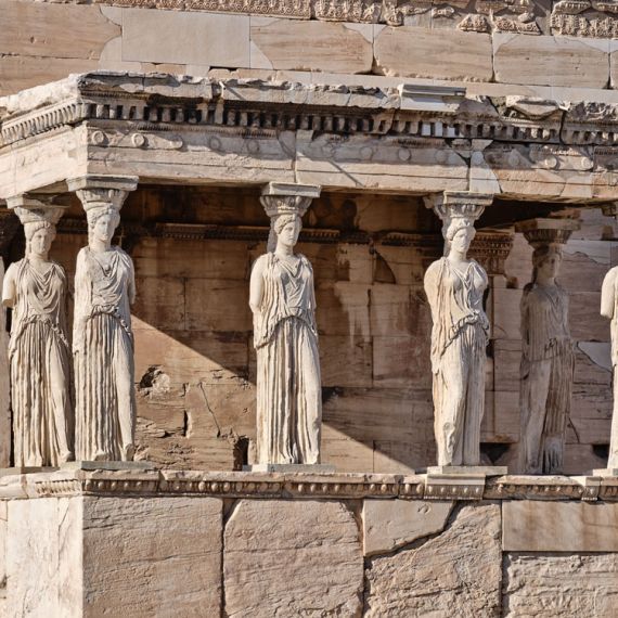 A high-definition fine art photograph of the Porch of the Caryatids in the Erechtheion on the Acropolis in Athens, Greece
