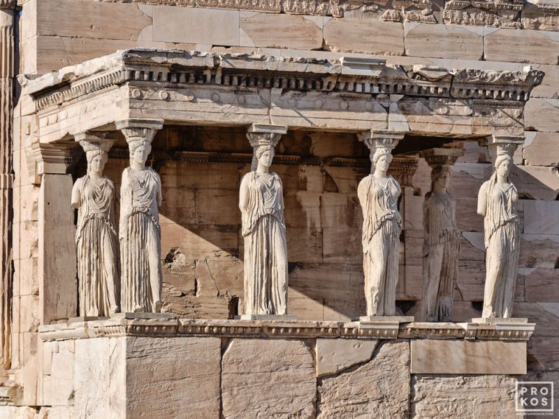 A high-definition fine art photograph of the Porch of the Caryatids in the Erechtheion on the Acropolis in Athens, Greece