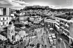 A high-definition black and white photo of the Acropolis, Parthenon and Plaka neighborhood seen from Monastiraki Plaza in Athens, Greece. Limited edition prints of this photo are available up to 96 inches in width.
