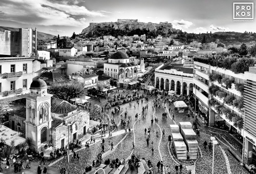 A high-definition black and white photo of the Acropolis, Parthenon and Plaka neighborhood seen from Monastiraki Plaza in Athens, Greece. Limited edition prints of this photo are available up to 96 inches in width.