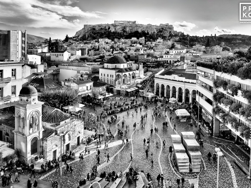 A high-definition black and white photo of the Acropolis, Parthenon and Plaka neighborhood seen from Monastiraki Plaza in Athens, Greece. Limited edition prints of this photo are available up to 96 inches in width.