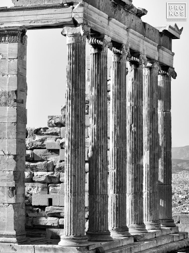 A black and white high-definition photo of the columns forming the portico of the Erechtheion temple at the Acropolis in Athens, Greece. Limited edition prints of this photo are available up to 80 inches in height.