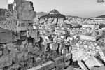 A black and white photograph of the view of Athens's famed Lykabettus Hill as seen from the Acropolis, Greece