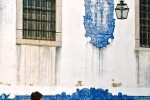 A fine art photo of street guitarist playing a mandolin in the Alfama district of Lisbon, Portugal