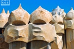 A fine art architectural photo of the Gaudi chimneys on the rooftop of the Casa Mila (La Pedrera), Barcelona, Spain