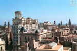 A view of the rooftops of Barcelona, Spain looking toward the sea. Fine art prints of this photo are available framed in various styles, please inquire.