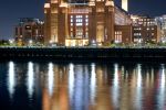 A view of Battersea Power Station reflected in the River Thames at night, London, United Kingdom. High-definition fine art prints of this photo are available up to 80 inches in height.